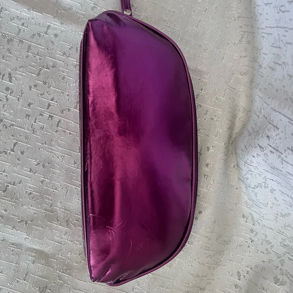 Purple Cosmetic Bag with Curved Shape and Sheen